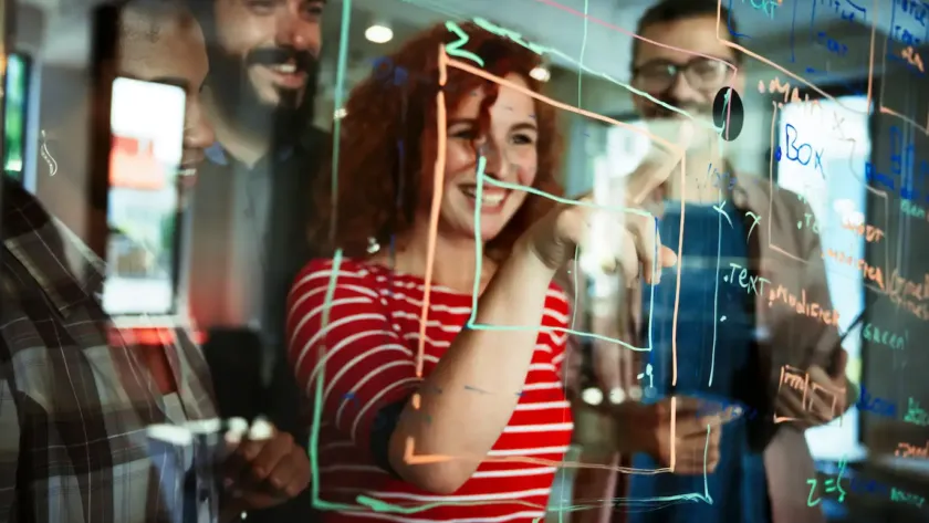 Software engineers working on projects and programming in-house. Teamwork concept for start-ups